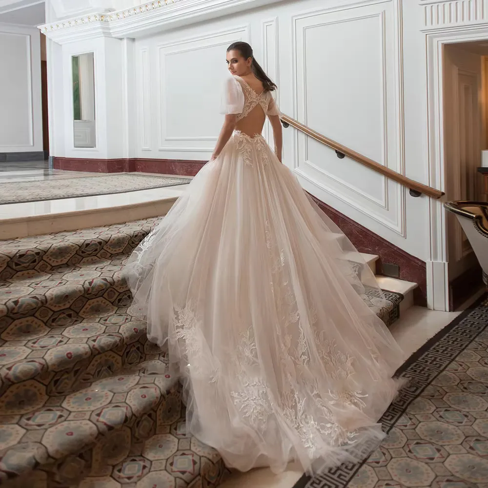 Long Sleeve Vintage Wedding Dress with Cut-out Back Appliques and Tulle